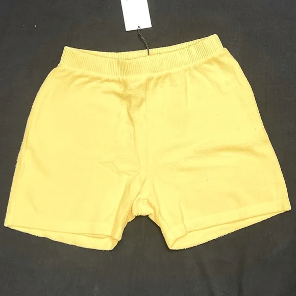 Brand New cozy stretch shorts, beautiful Pastel Yellow. Size M Fast shipping