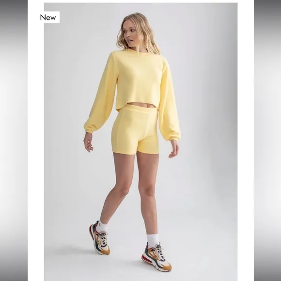 Brand New cozy stretch shorts, beautiful Pastel Yellow. Size M Fast shipping