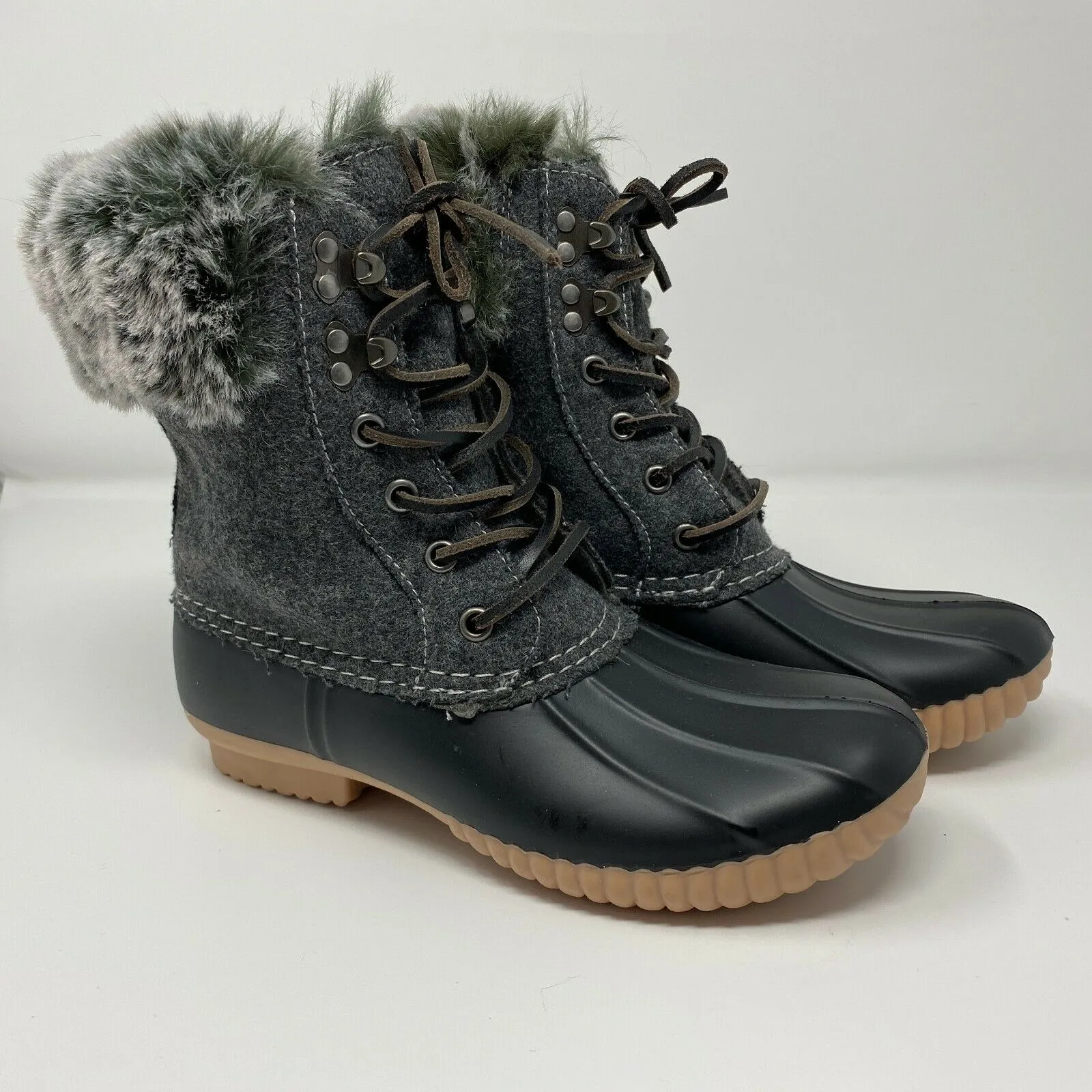 Brand new Report Ursela Black & Grey Lace Up Ultra Soft Faux Fur Duck Boots Women's Size 7.5! would fit youth size 5.5 as well! Retails $93 